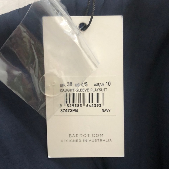 Romper with tag never worn - Picture 2 of 2